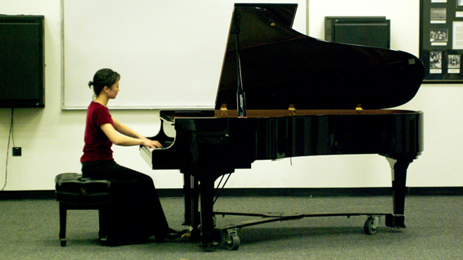 A competitor playing a piece in one of the earliest Guthman Competitions.