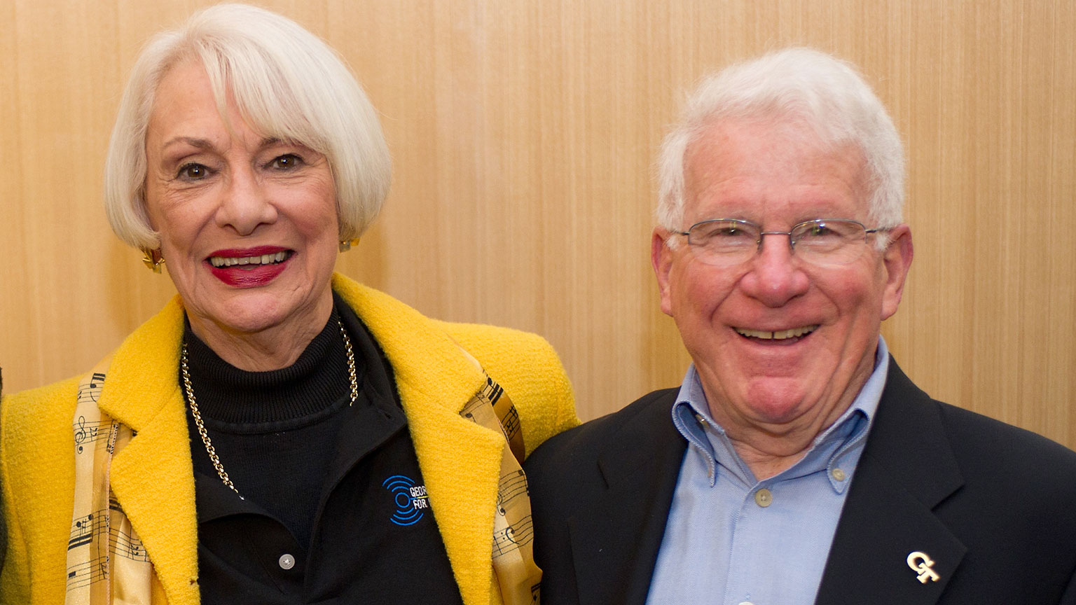 Margaret Guthman, left, wearing a yellow jacket, and Richard Guthman, right.
